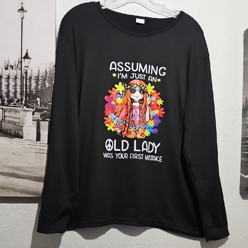 Black Relaxed Long Sleeve Hoodie with Psychedelic Graphic
